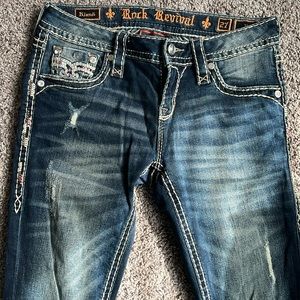 Rock Revival “Klandi” distressed boot cut jeans size 27
